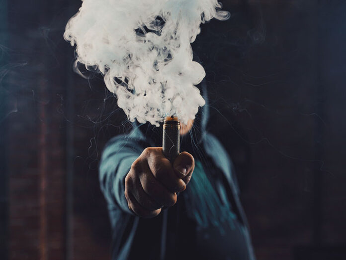 Man vaping an electronic cigarette
